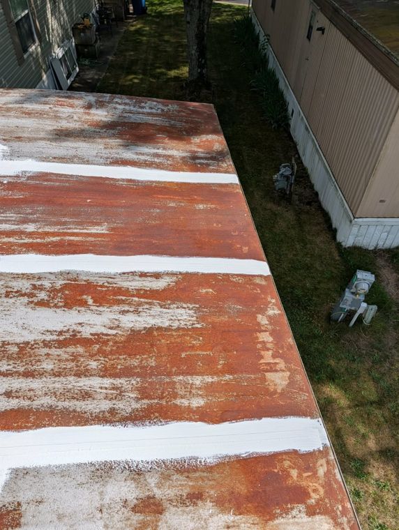 Rusted roof before